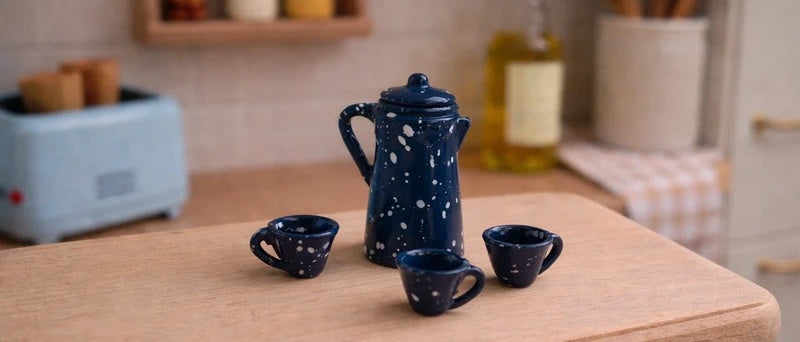 Théière bleu moucheté et ses tasses