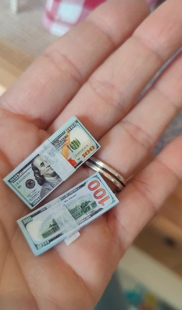 2 liasses de billets