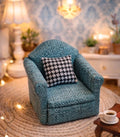 Fauteuil vert et coussin