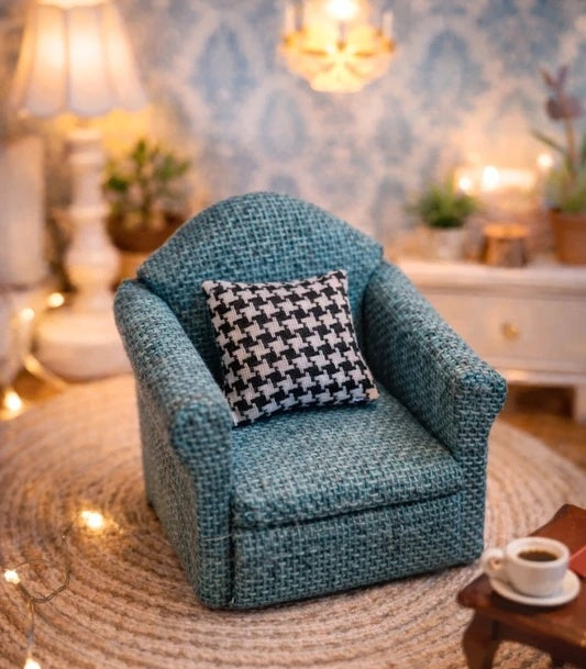 Fauteuil vert et coussin