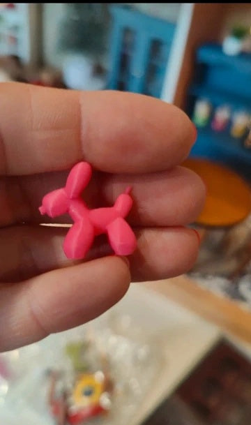 Petit chien rose décoratif