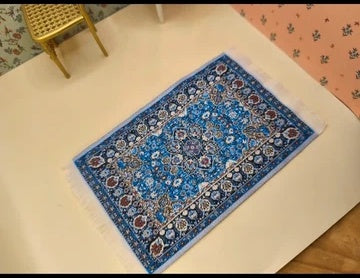 Tapis à franges bleu