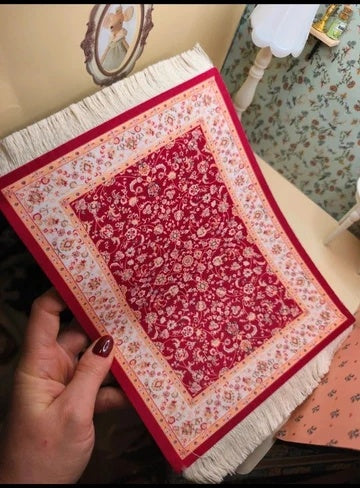 Tapis rouge à franges