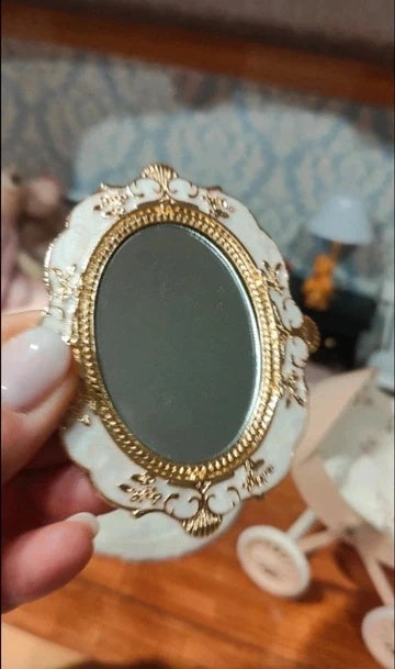 Miroir blanc et doré