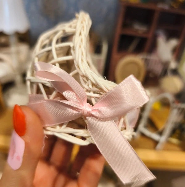 Couffin osier avec noeuds rose