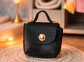 Petit sac noir en simili cuir