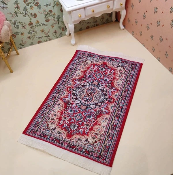 Petit tapis à franges bordeaux