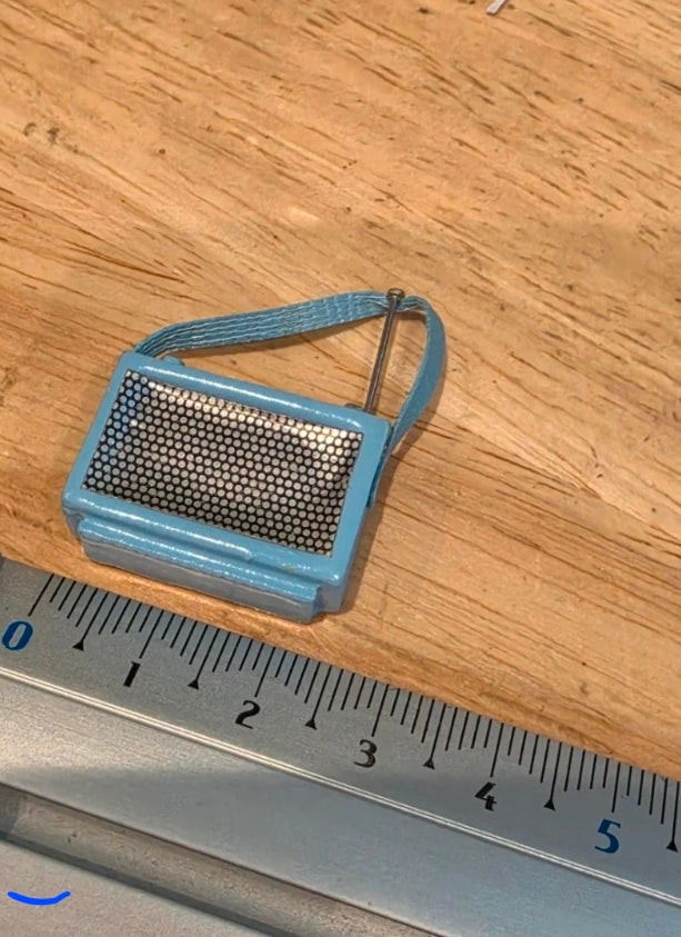 Poignée effet cuir de la radio miniature métallique