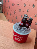 Seau coca cola et ses glaçons