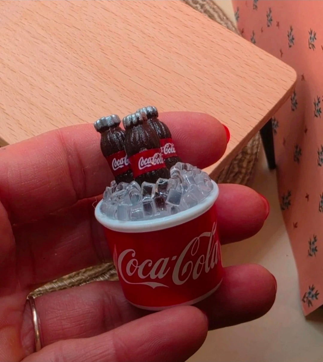 Seau coca cola et ses glaçons