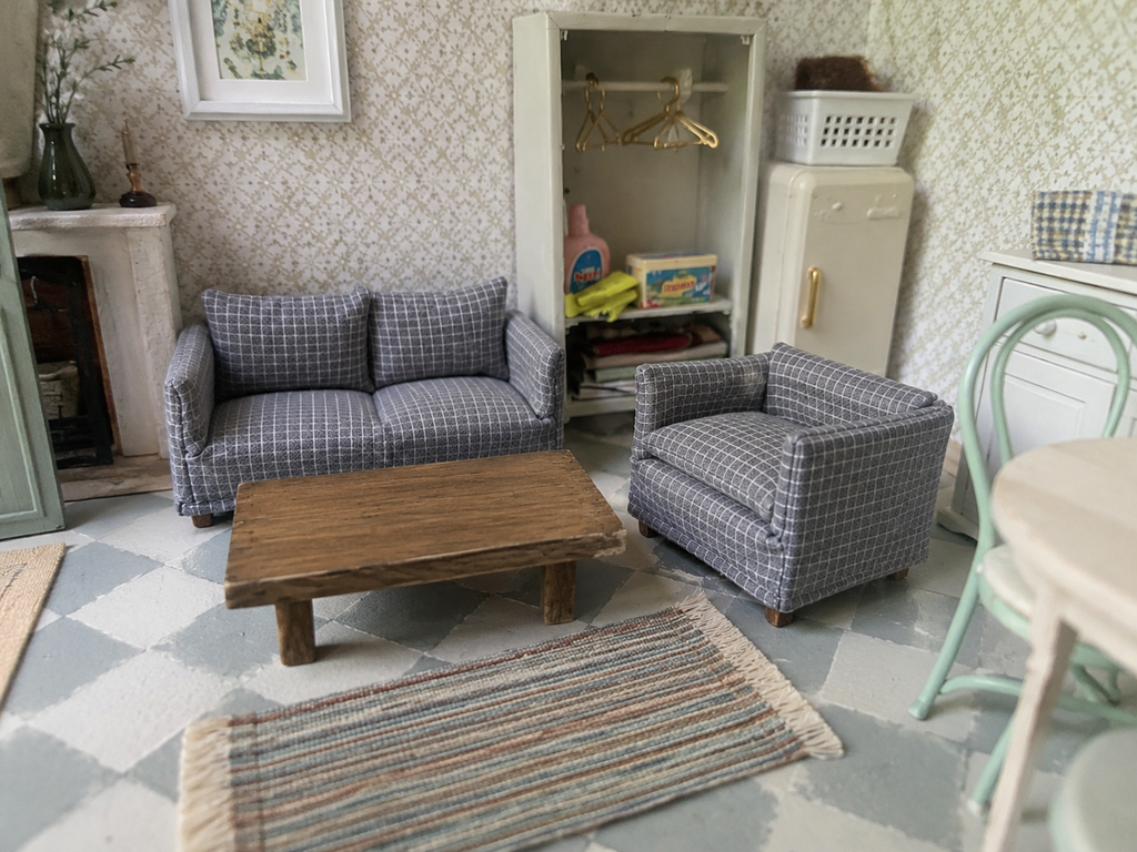 Ensemble fauteuil et Canapé en tissu gris à petits carreaux