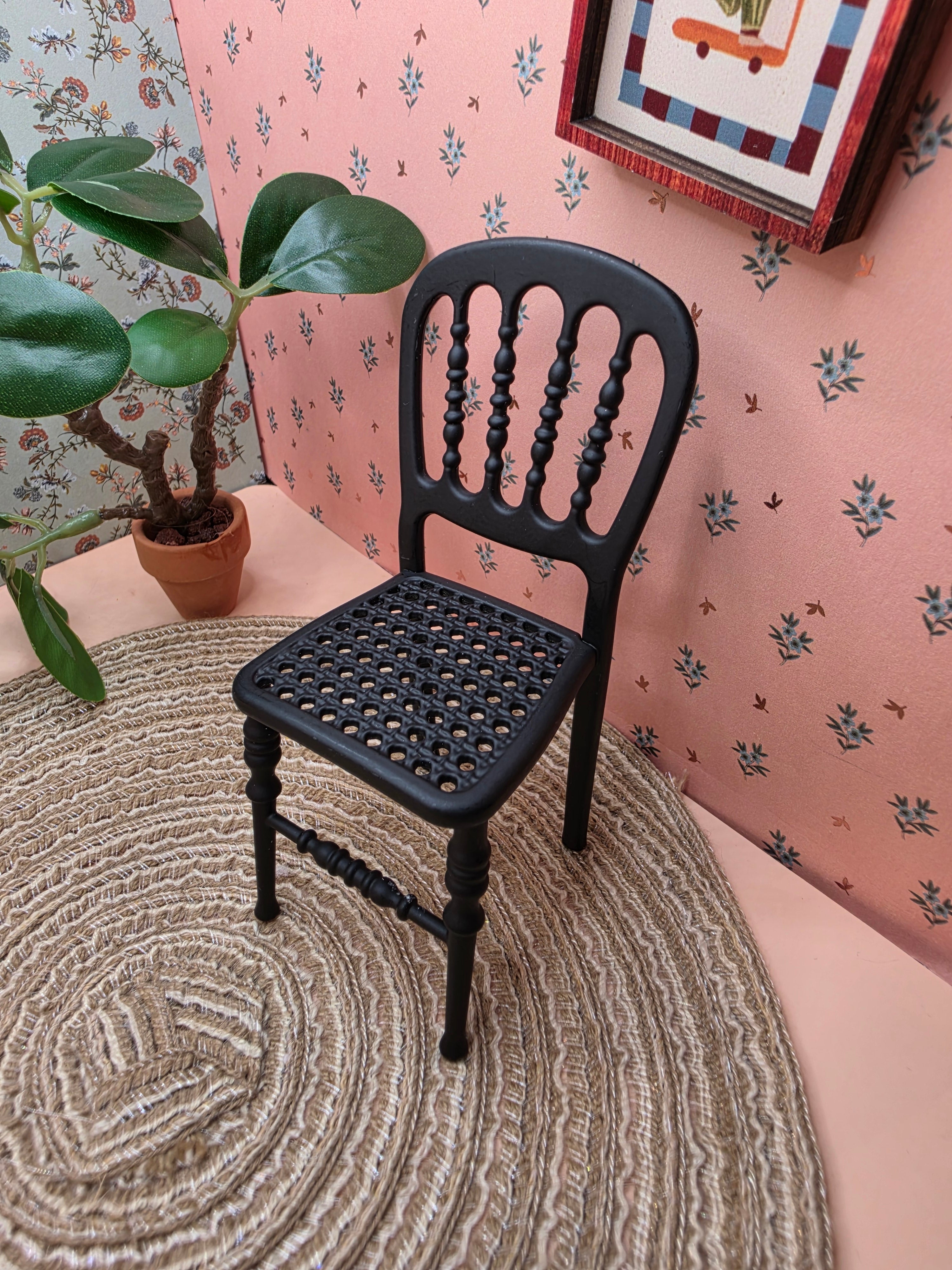 Détail du piétement de la table ovale miniature en métal noir